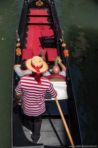 Venice - tourists enjoy Venice on board of a gondola | Venedig  - Touristen genießen Venedig vom Wasser aus